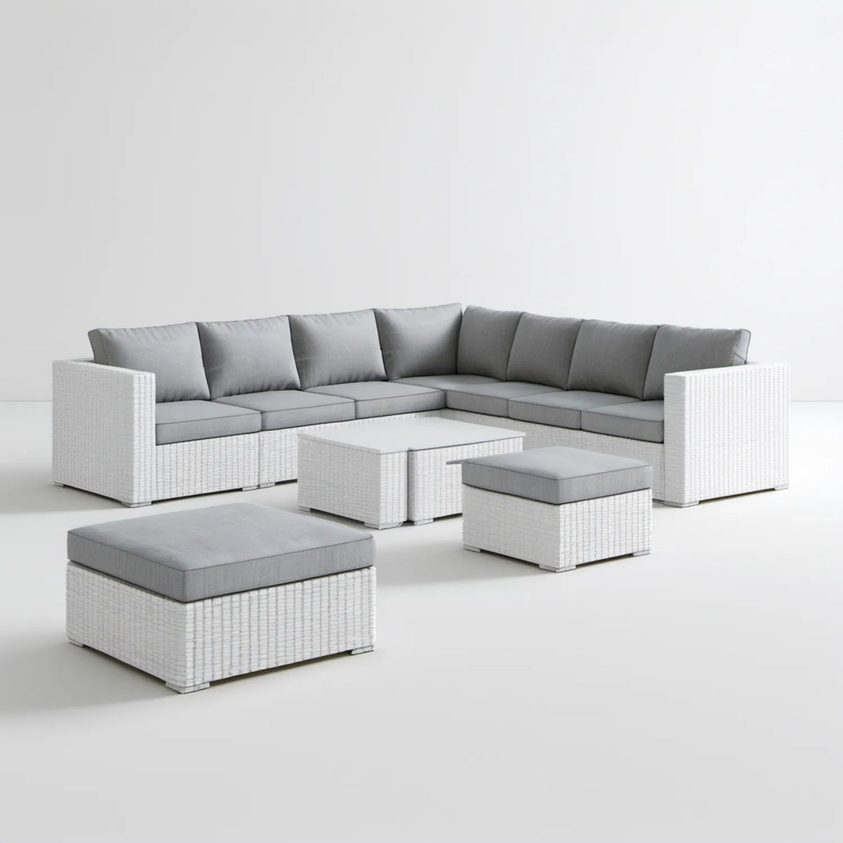 Biało-szary narożnik ogrodowy z technorattanu PE 230 x 230 x 75 cm ze stolikiem i 2 pufami